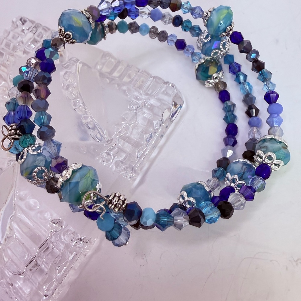 Shades of blue glass and crystal memory wire bracelet